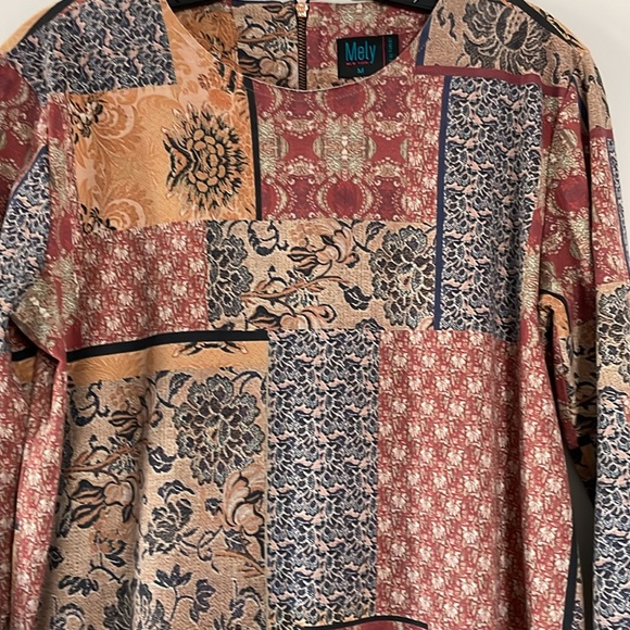 Mely - Picture 3 of 8